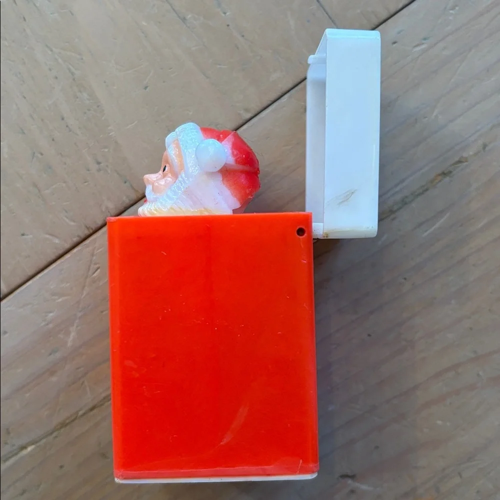 Vintage Pop-Up Squeaky Toy Santa in Chimney